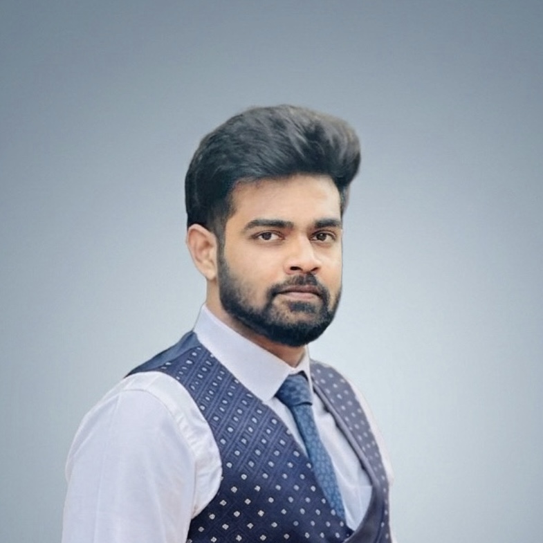 Rini Vishwas wearing a formal waistcoat and tie